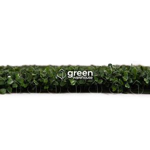 El Follaje Artificial Boxwood Tiene una hoja pequeña de color verde oscuro y una agradable textura.